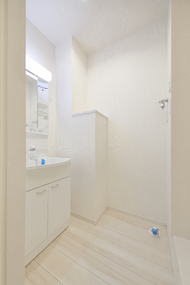 洗面設備　202号室の写真を引用