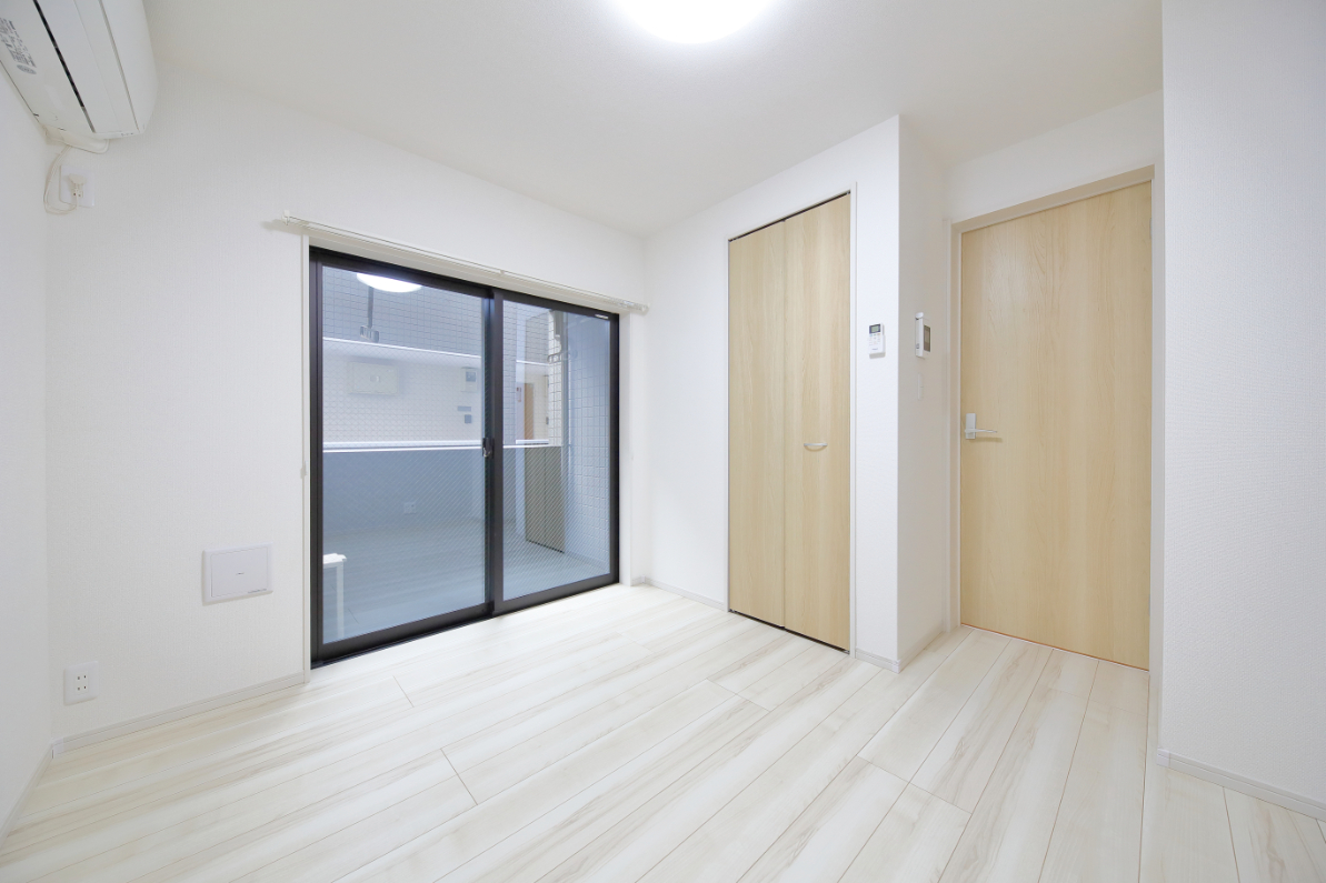 居室・リビング　202号室の写真を引用