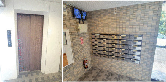 エントランス　エレベーターと郵便受けです。