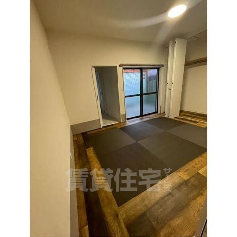 地下鉄東西線 太秦天神川駅 徒歩20分 1階建 築62年の居間写真