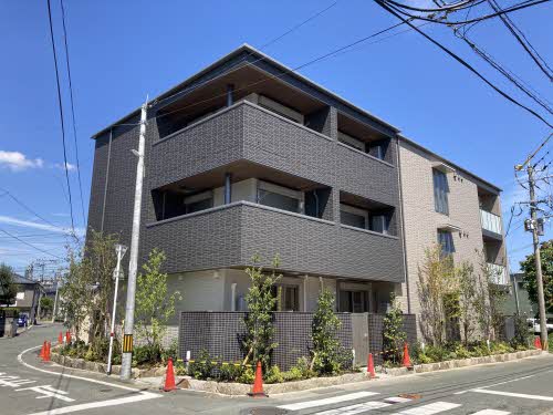 【熊本市南区日吉のマンションの建物外観】