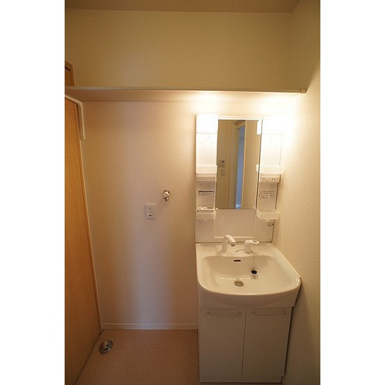 洗面設備　※写真は同型別室のものです。現況優先となります。