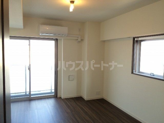 都営大江戸線 門前仲町駅 徒歩8分 8階建 築12年の居間写真
