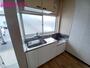キッチン　同物件別部屋の写真