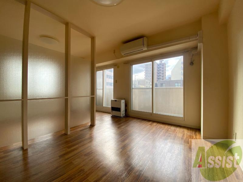 札幌市電 西線６条駅 徒歩7分 10階建 築22年の居間写真