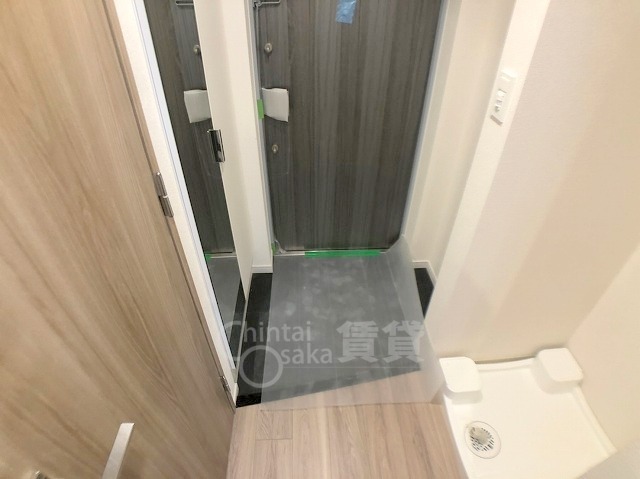 プレサンス東三国駅前グランクラスの玄関写真