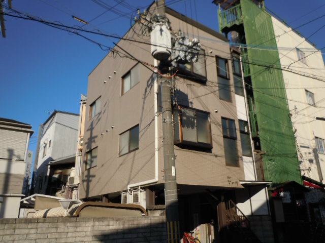 京都市上京区紙屋川町のマンションの建物外観