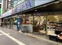 スーパー　明治屋 六本木ストアー（スーパー）まで704m