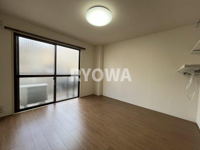 谷中1丁目賃貸住宅の居間写真