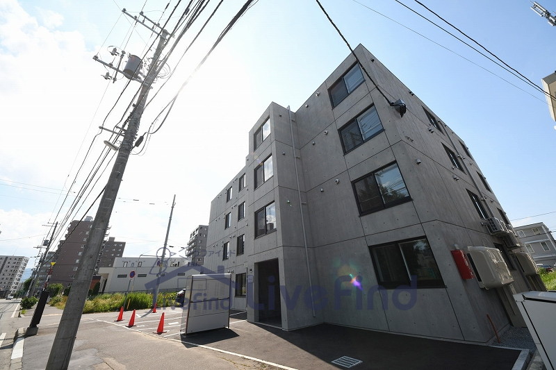 【札幌市白石区菊水九条のマンションの建物外観】