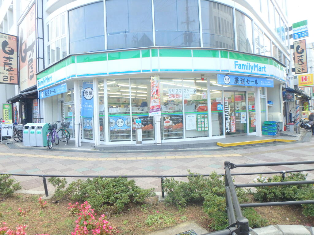 コンビニ　ファミリーマート貝塚港北店（コンビニ）まで192m