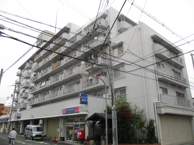 大阪市住之江区東加賀屋のマンションの建物外観