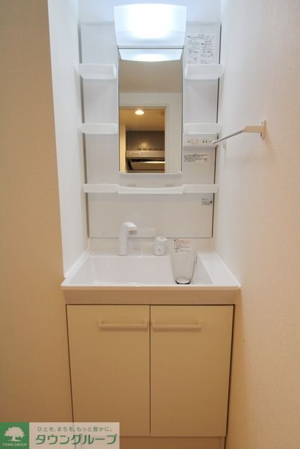 洗面設備　同施工会社同タイプ　の別建物写真になります。