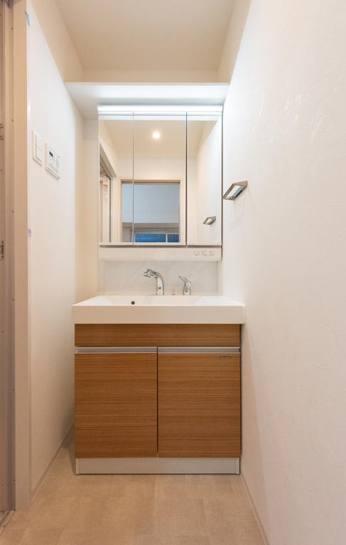 洗面設備　写真は別室のものです