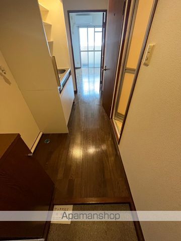 プレアール塔原東の玄関写真