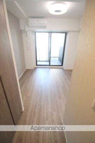 ルネフラッツ谷町四丁目の居間写真