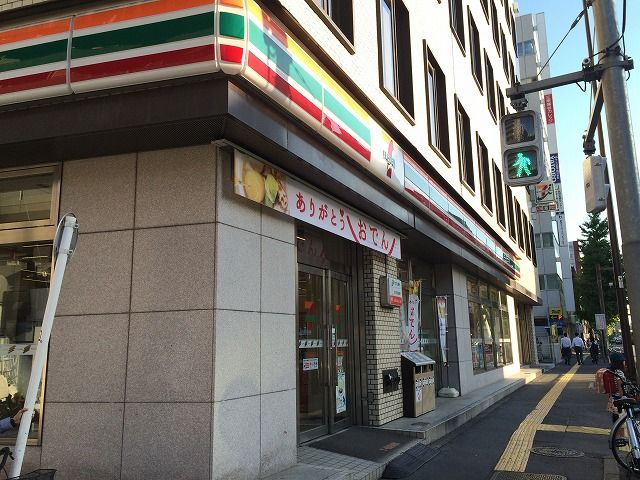 コンビニ　セブン-イレブン足立中居郵便局前店（コンビニ）まで247m