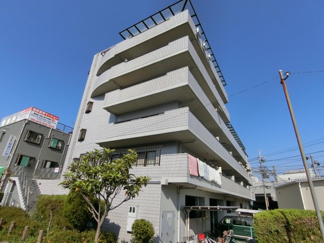 【寝屋川市萱島信和町のマンションの建物外観】