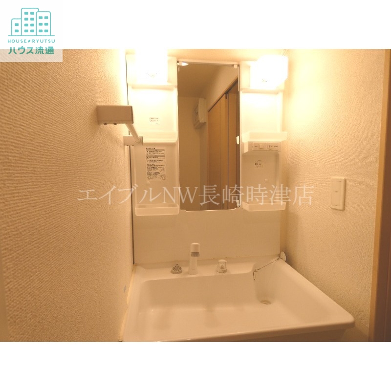 洗面設備　※別号室の写真です