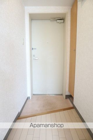 地下鉄南北線 北１８条駅 徒歩15分 4階建 築22年の玄関写真