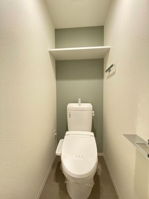 地下鉄御堂筋線 東三国駅 徒歩7分 15階建 築7年のトイレ写真