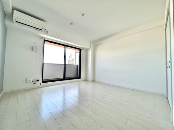 居室・リビング　※別号室のお写真です。