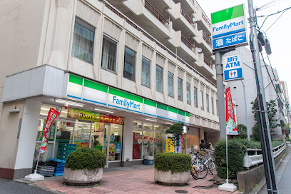 コンビニ　ファミリーマート 北大塚店（コンビニ）まで590m