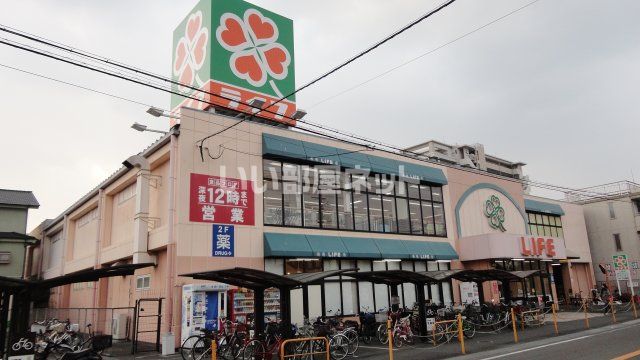 スーパー　ライフ 正雀店（スーパー）まで393m