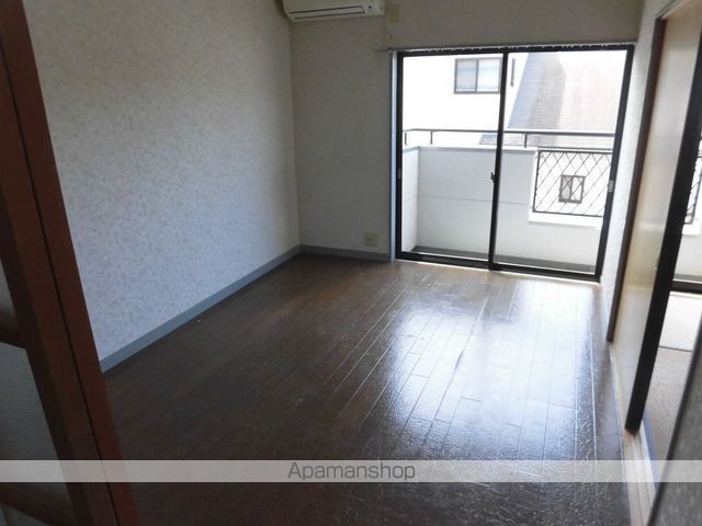 メゾンつかさの居間写真