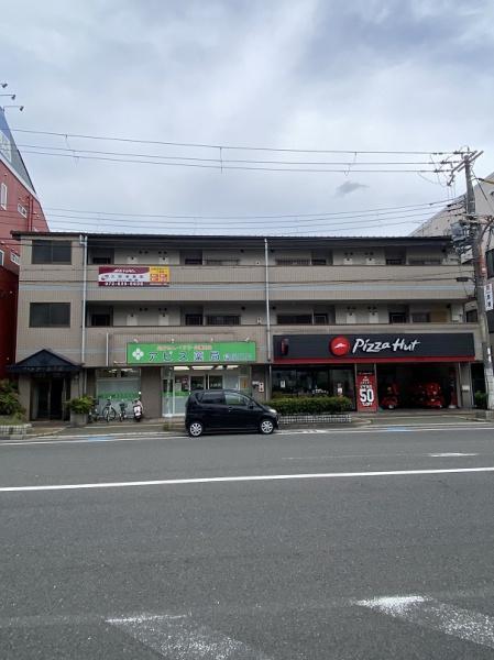 寝屋川市八坂町のマンションの建物外観