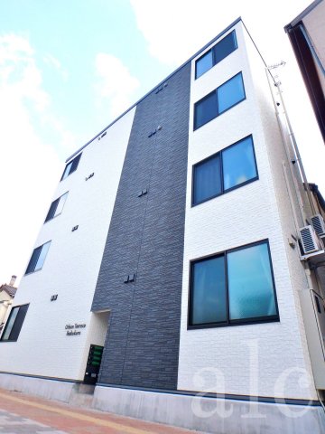 建物外観　4階建て・外壁サイディング。きれいな外観です。