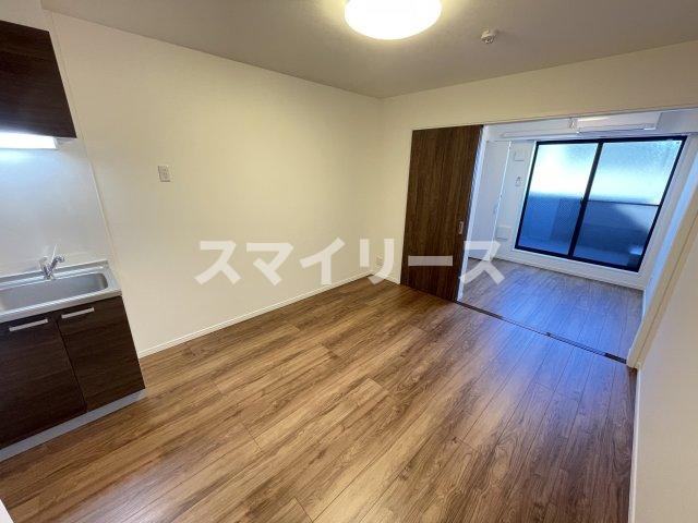 東武野田線 豊四季駅 徒歩5分 3階建 築1年の居間写真