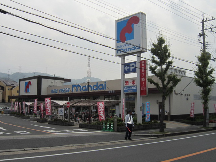 コンビニ　万代倉治店（コンビニ）まで597m