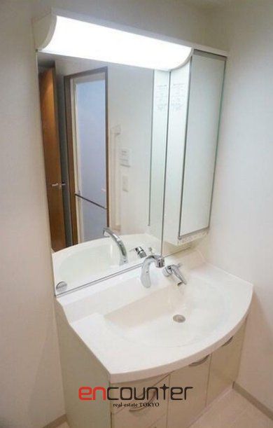 洗面設備　※同マンション別室参考写真