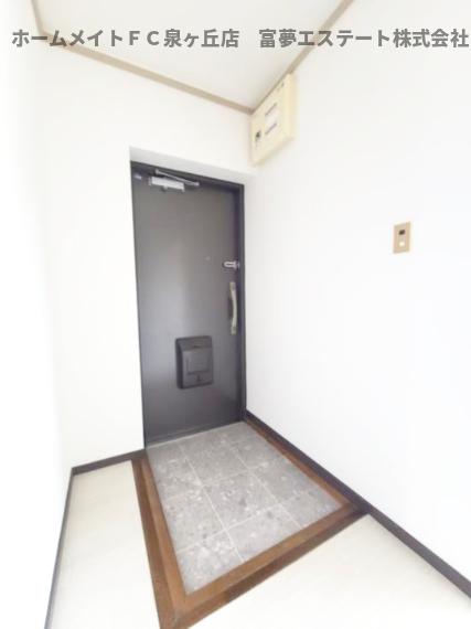 新檜尾台第2次住宅5号棟の玄関写真