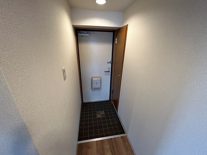 Y’Sコート蘭びっくの玄関写真