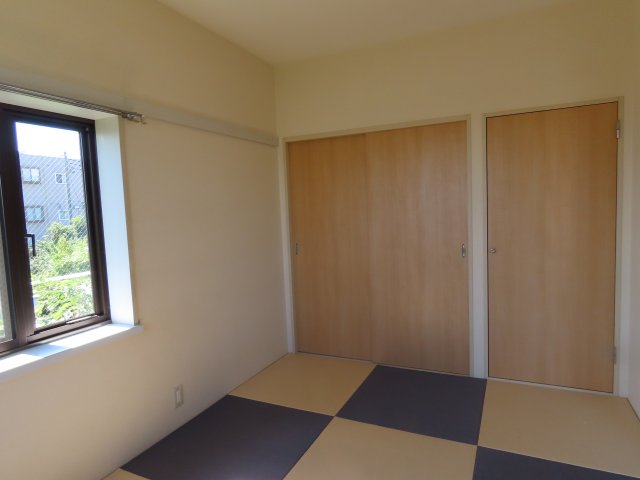 リバービレッジAの居間写真