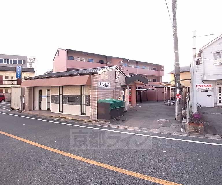 京田辺市三山木野神のマンションの建物外観