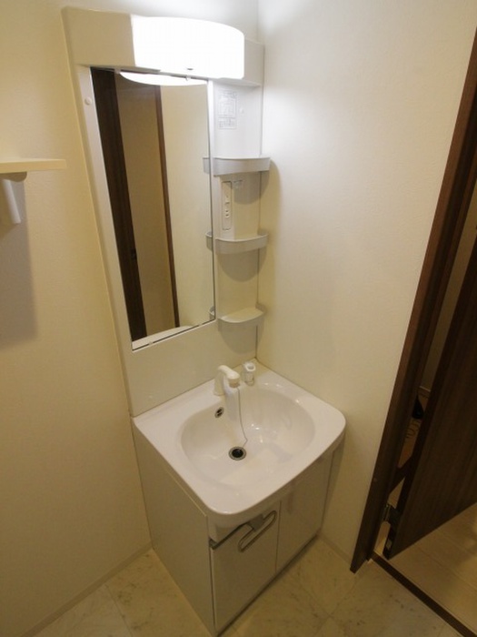 洗面設備　※写真は同型タイプ、現況優先。