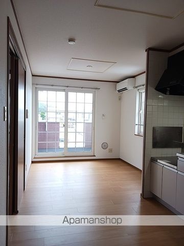 セントラル明日香 Aの居間写真