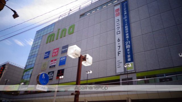 コンビニ　ファミリーマート（コンビニ）まで1054m