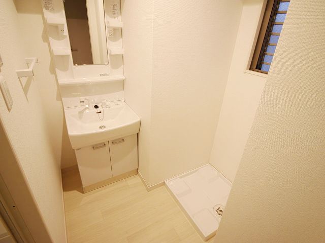 洗面設備　※写真は同型タイプ、現況優先。