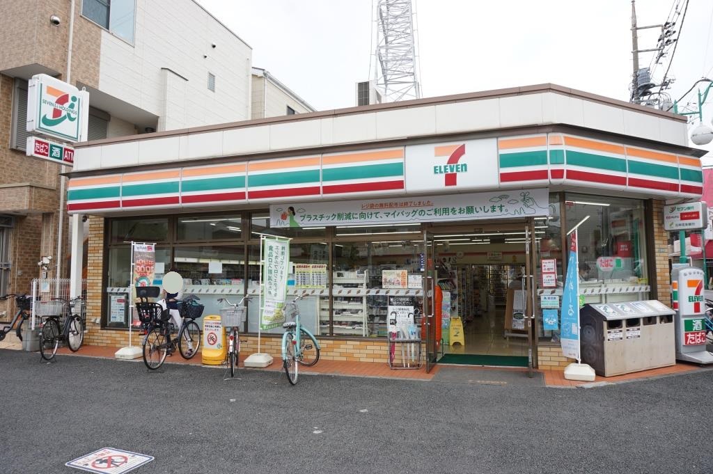 コンビニ　セブンイレブン 足立青井駅前店（コンビニ）まで407m