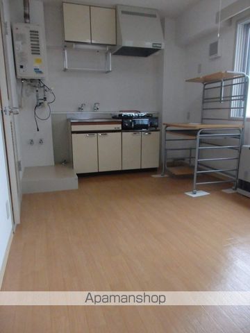 藤井ビル北14条の居間写真