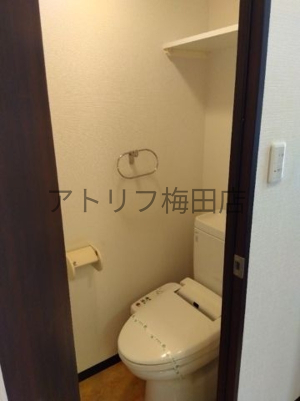 地下鉄堺筋線 天神橋筋六丁目駅 徒歩2分 15階建 築19年のトイレ写真
