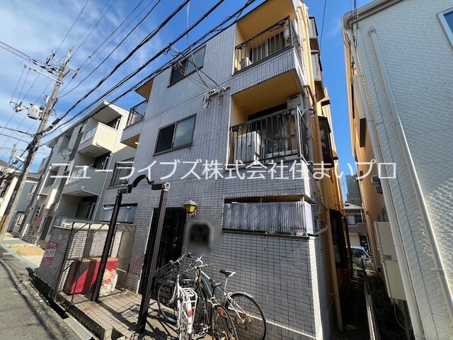 寝屋川市萱島桜園町のマンションの建物外観