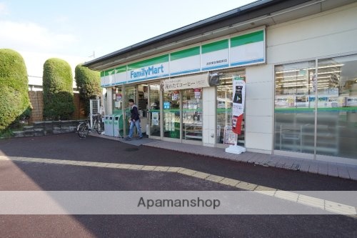 コンビニ　ファミリーマート　近鉄東生駒駅前店（コンビニ）まで597m