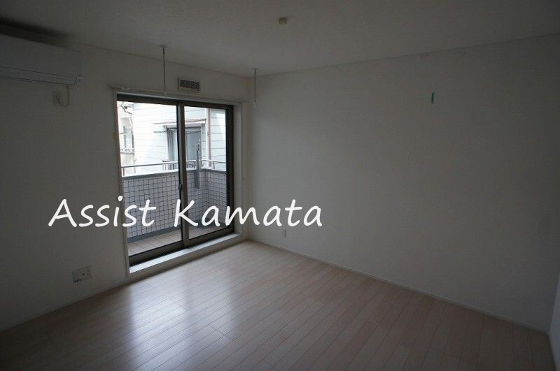 居室・リビング　写真は同タイプの別号室です