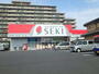ドラックストア　ドラッグストアセキ大成町店（ドラッグストア）まで528m