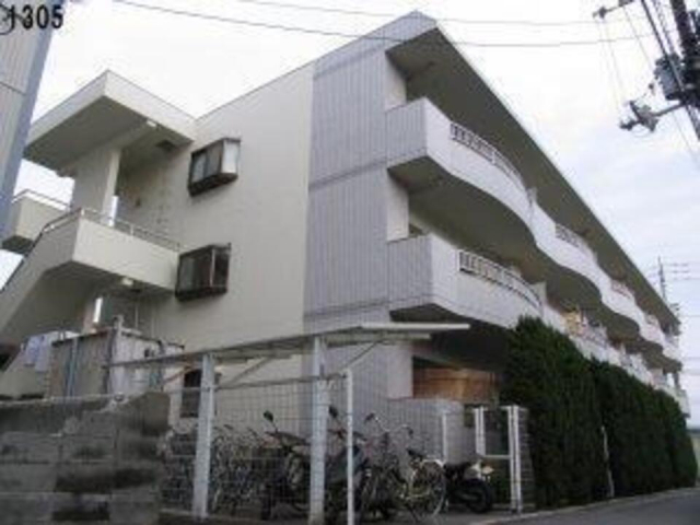 松山市美沢のマンションの建物外観